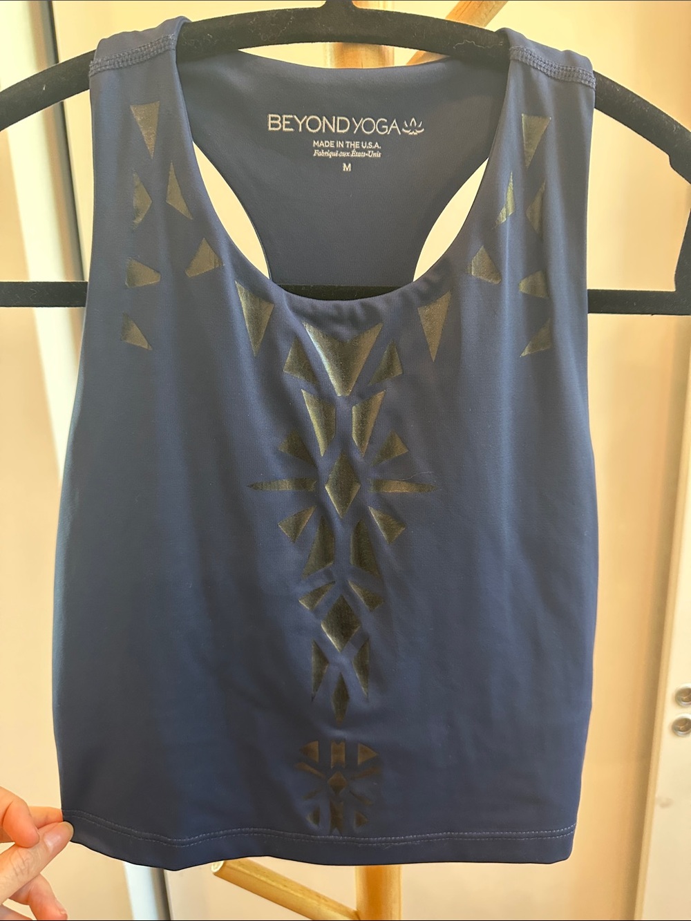 Beyond Yoga Navy Racerback Crop Tank with Laser-Cut Accents, built in bra